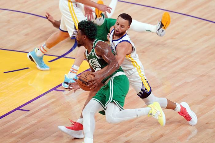 Jun 5, 2022; San Francisco, California, USA; Golden State Warriors guard Stephen Curry (30) defends against Boston Celtics guard Marcus Smart (36) in the first half during game two of the 2022 NBA Finals at Chase Center. Mandatory Credit: Cary Edmondson-USA TODAY Sports